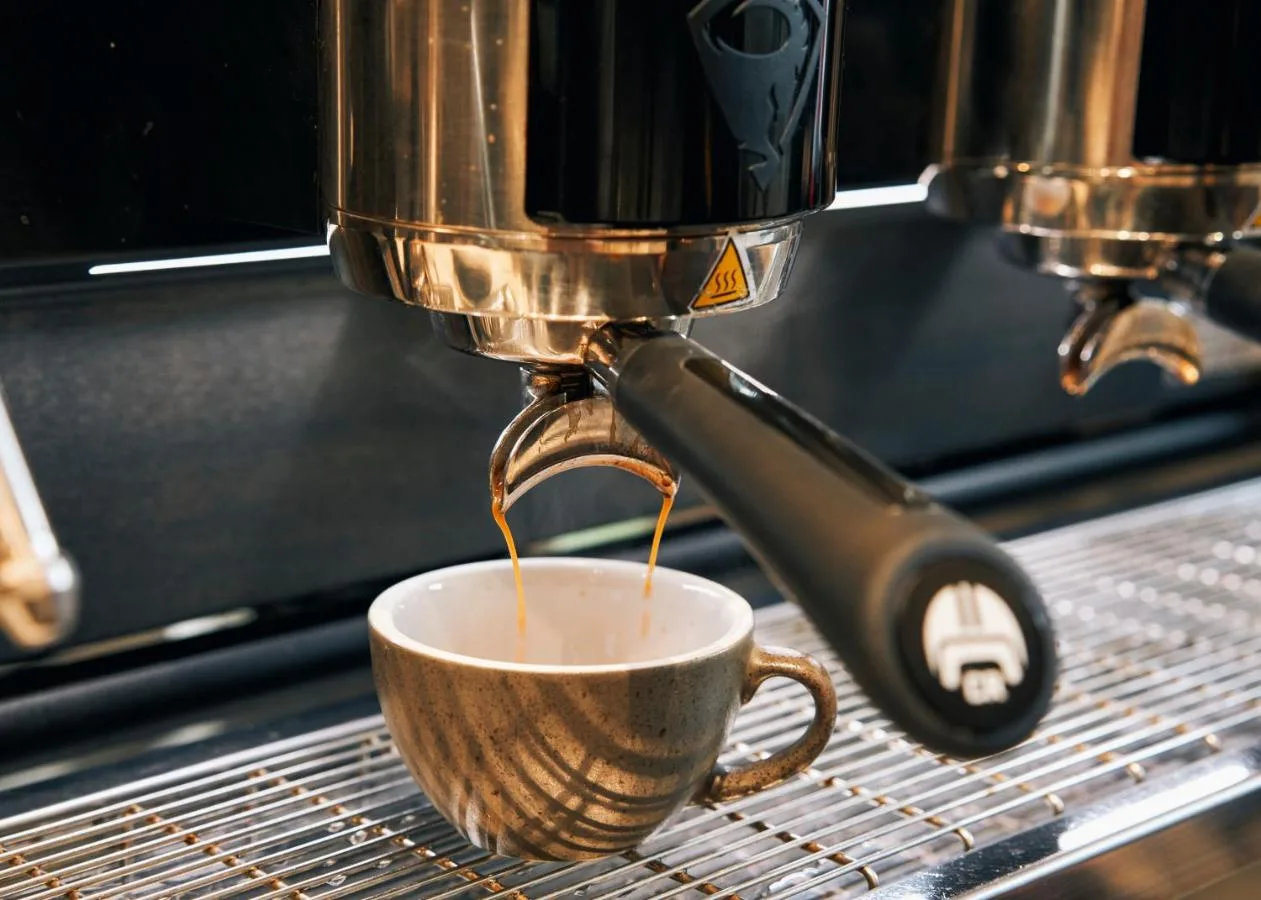 a coffee maker is making a cup of coffee at Page8, Page Hotels in London